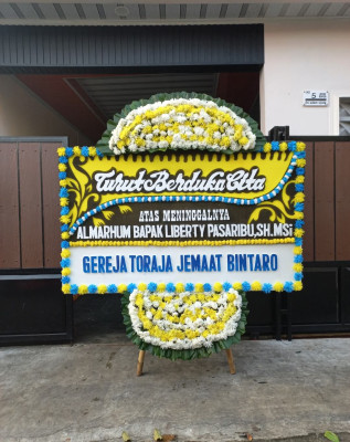 Papan Bunga Duka di Wargaluyu